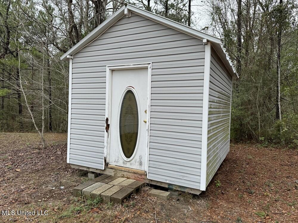 19438 Pete Hickman Road Saucier, MS 39574 - Photo 14 of 16 Shed