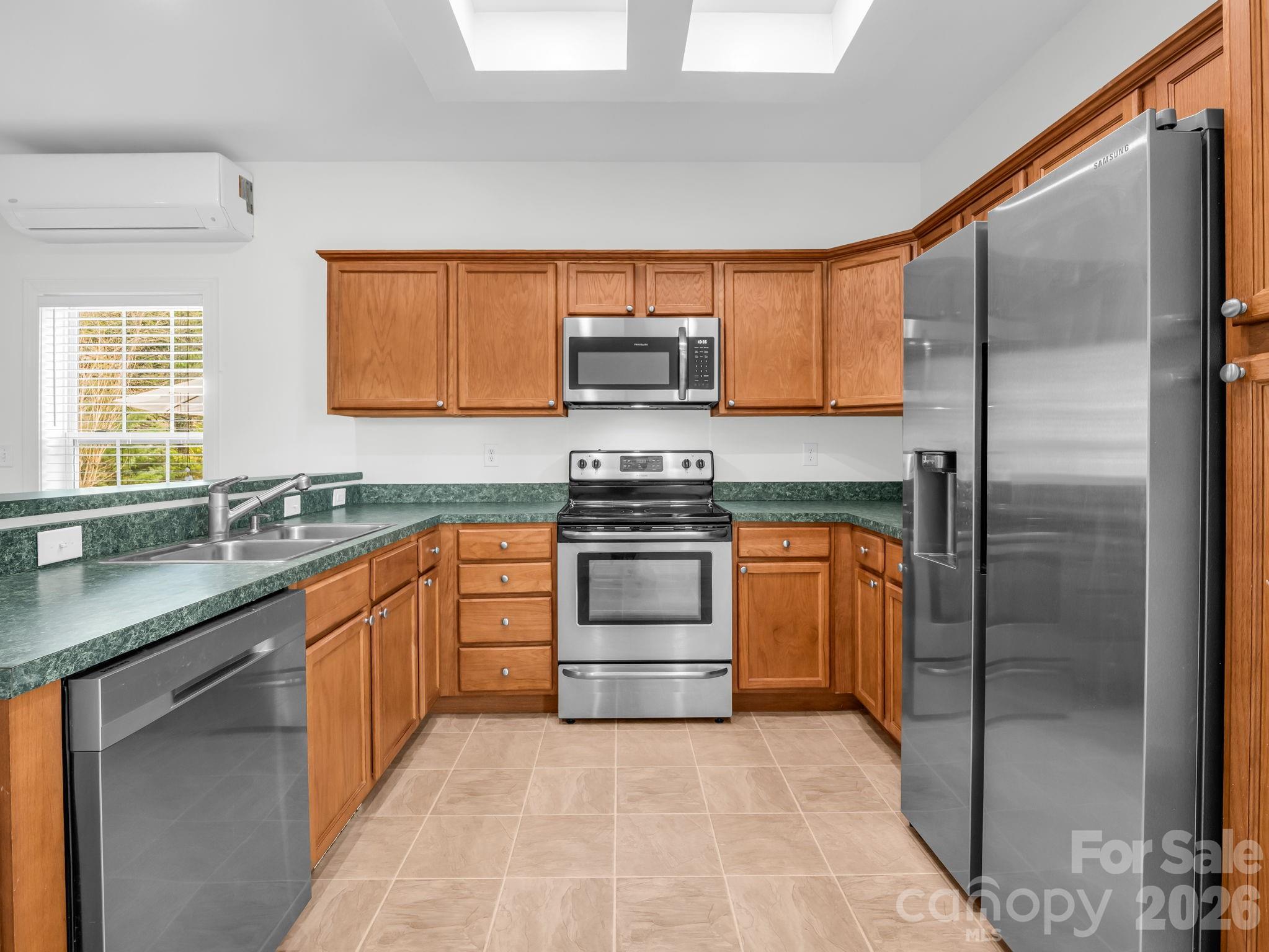19 Lynnbrook Way Columbus, NC 28722 - Photo 14 of 45 a kitchen with stainless steel appliances granite countertop a refrigerator and a sink