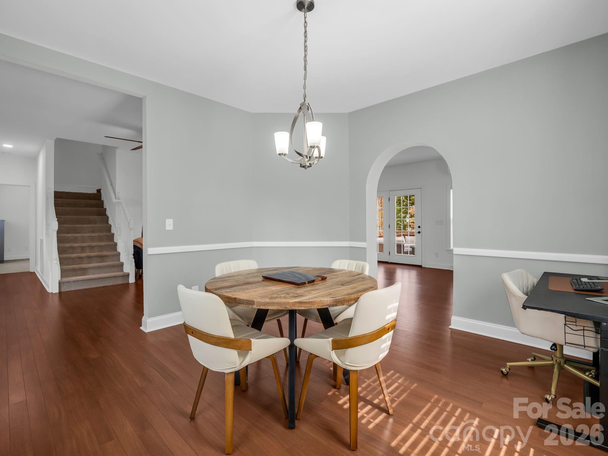 19 Lynnbrook Way Columbus, NC 28722 - Photo 17 of 45 a view of a dining room with furniture and wooden floor