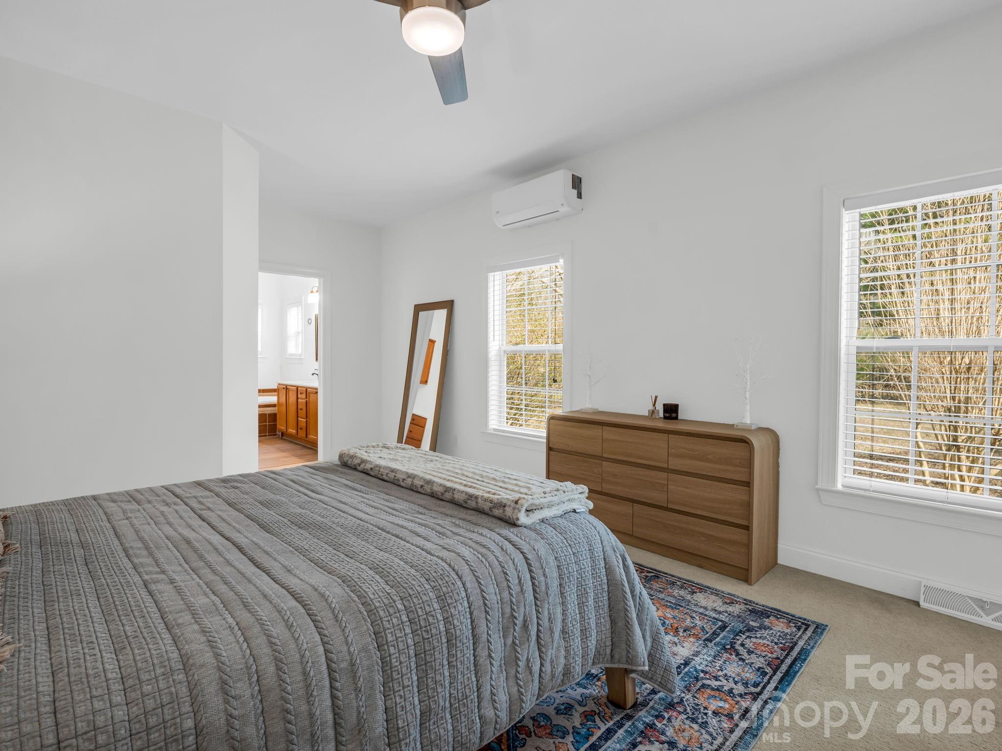 19 Lynnbrook Way Columbus, NC 28722 - Photo 20 of 45 a bedroom with a bed and a window
