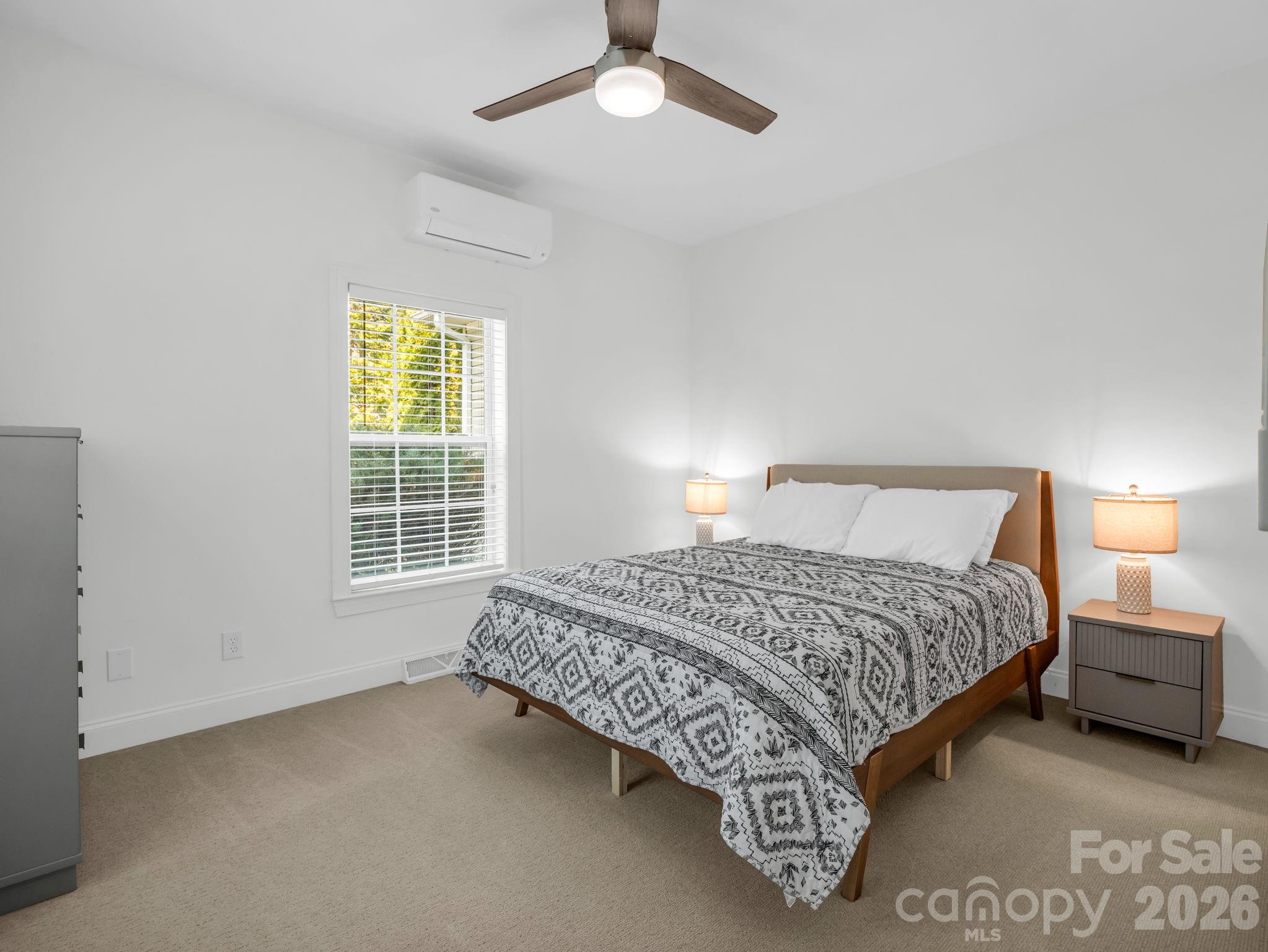 19 Lynnbrook Way Columbus, NC 28722 - Photo 25 of 45 a bedroom with a bed and a window