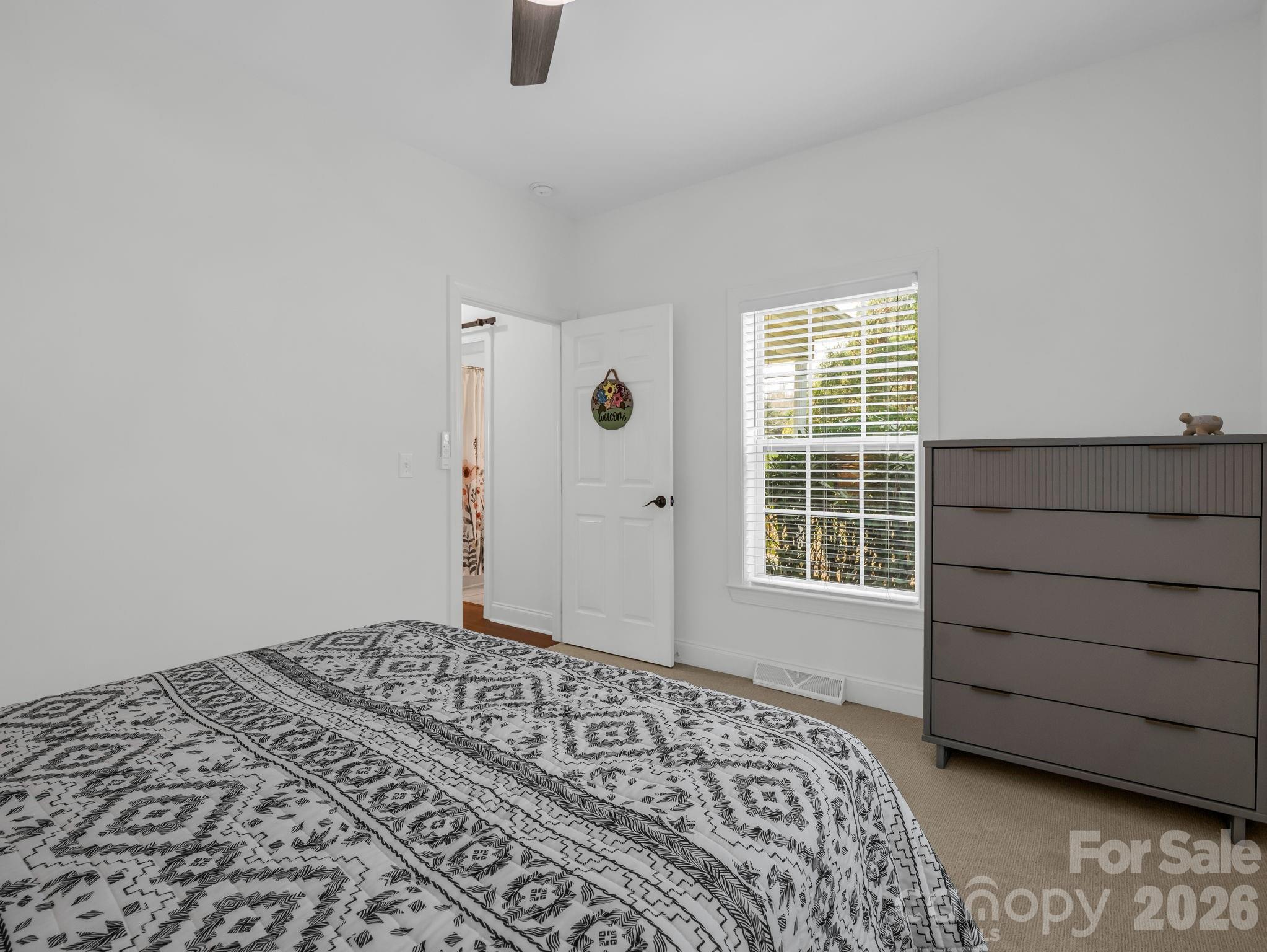19 Lynnbrook Way Columbus, NC 28722 - Photo 27 of 45 a bedroom with a bed and a window
