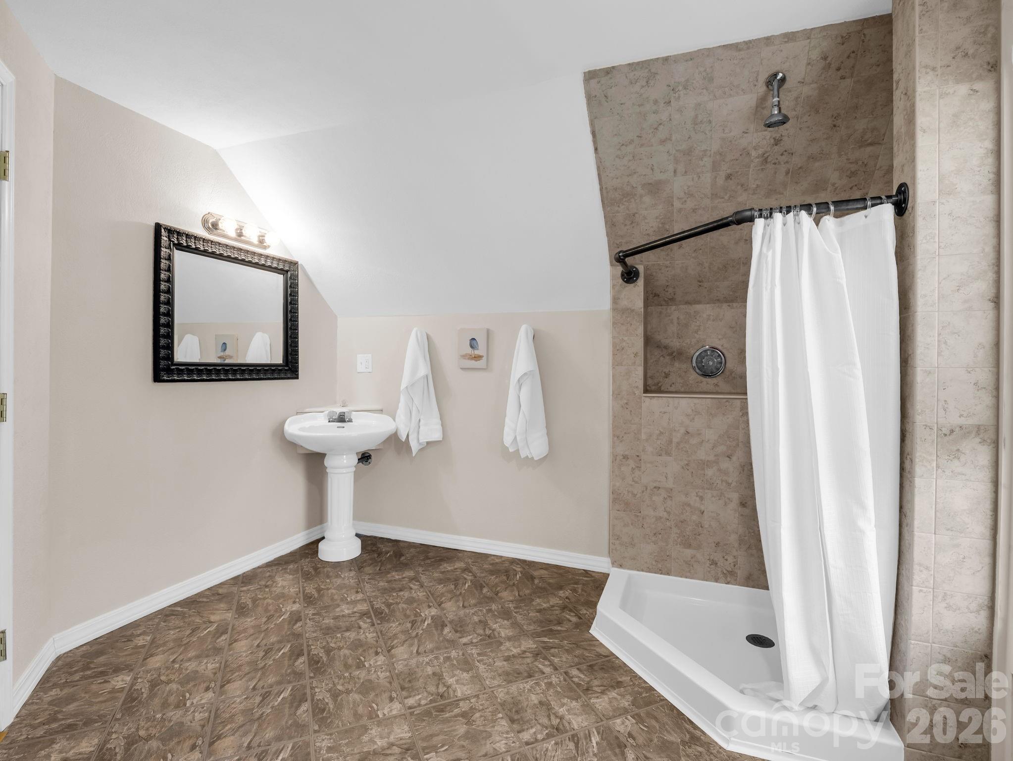 19 Lynnbrook Way Columbus, NC 28722 - Photo 34 of 45 a view of a hallway with a bathroom