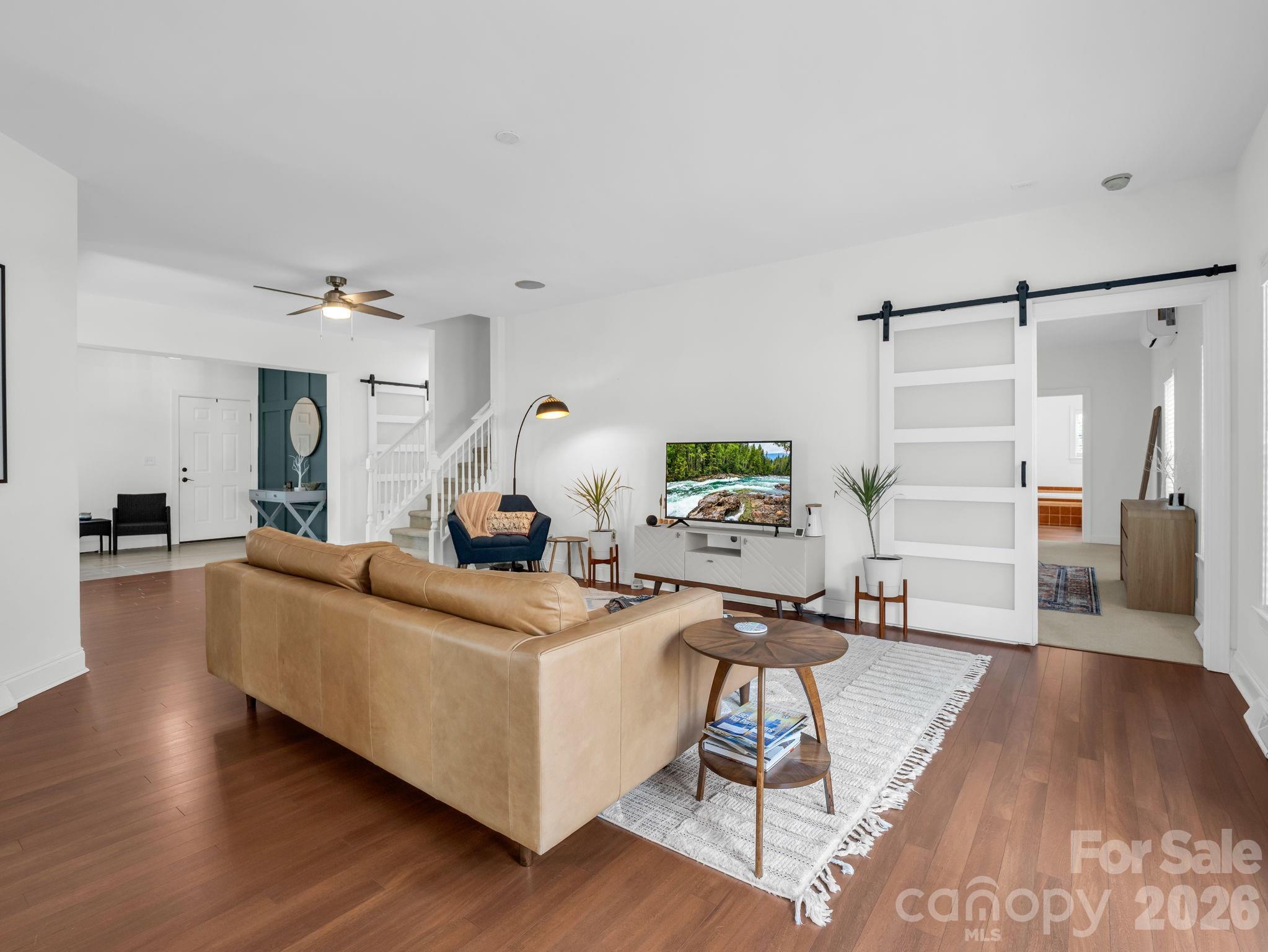 19 Lynnbrook Way Columbus, NC 28722 - Photo 10 of 45 a living room with furniture and a wooden floor