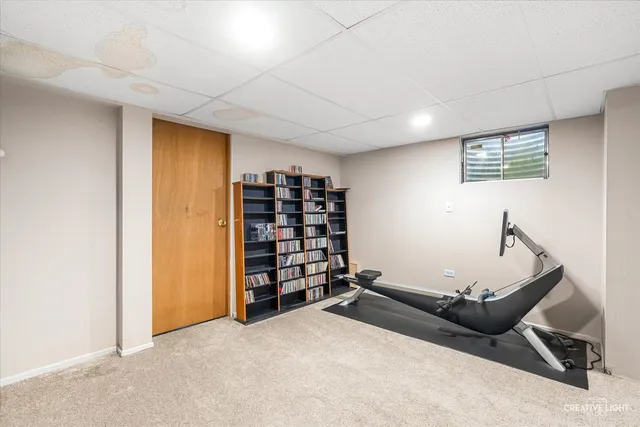 a room with furniture and air hockey table