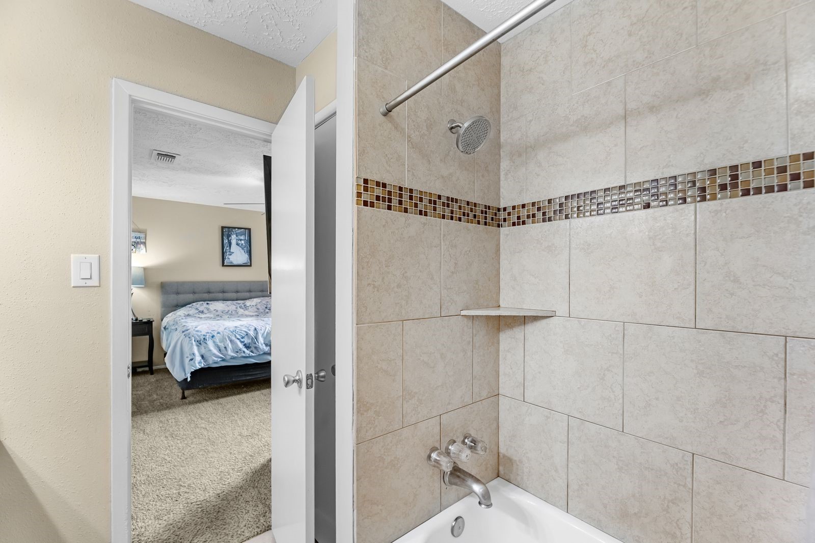 20931 Fernhollow Lane Spring, TX 77388 - Photo 14 of 24 a en suite bathroom with a shower and a sink