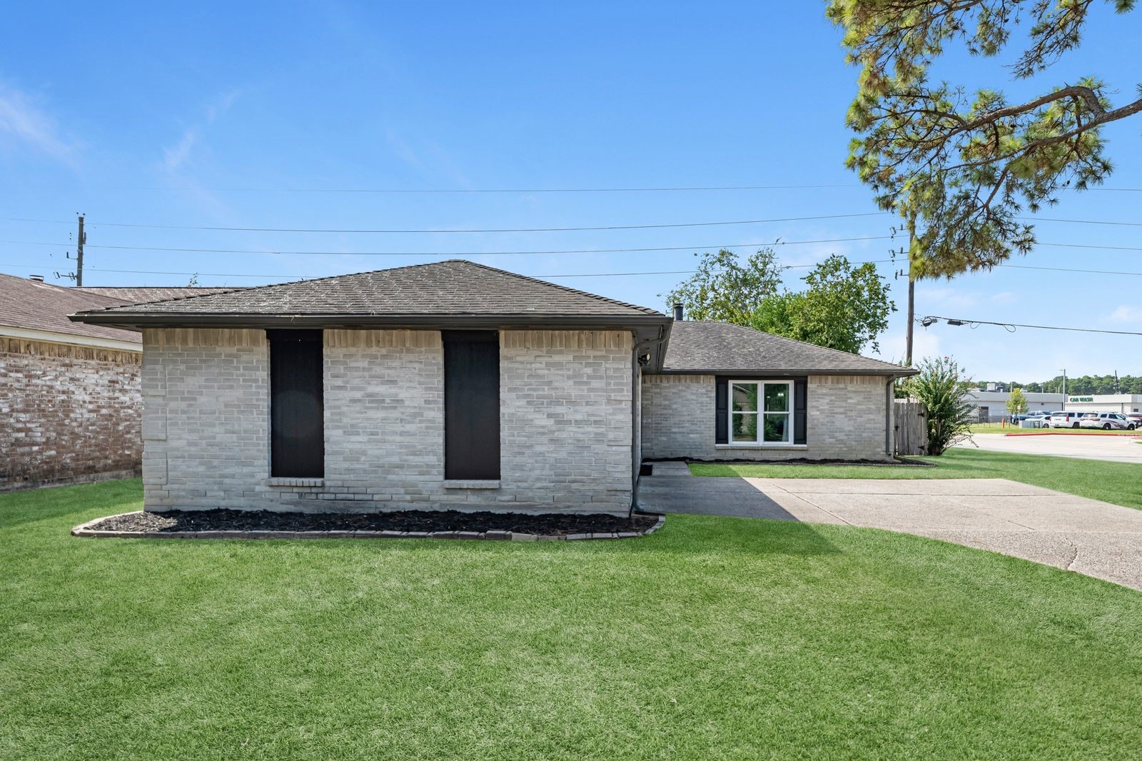 20931 Fernhollow Lane Spring, TX 77388 - Photo 2 of 24 a front view of a house with a garden
