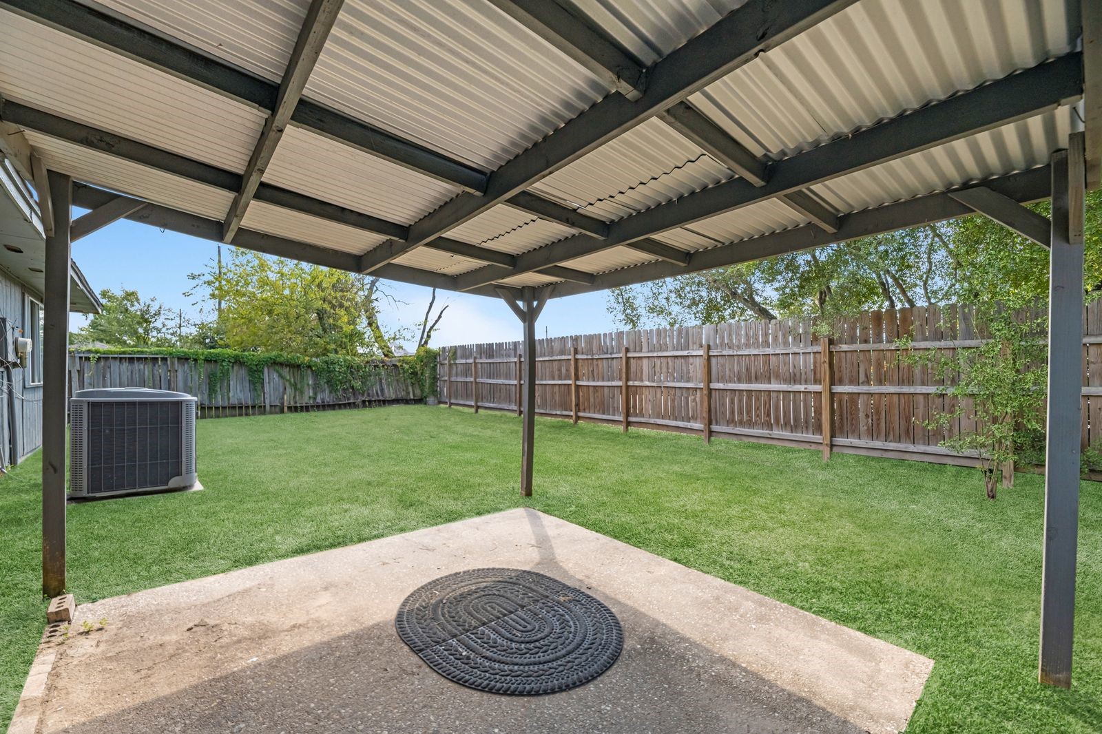20931 Fernhollow Lane Spring, TX 77388 - Photo 22 of 24 a view of a backyard with plants and a garden
