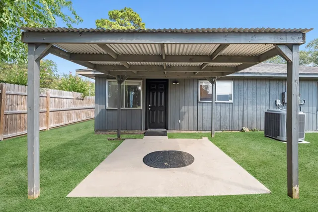 a view of a porch with a backyard