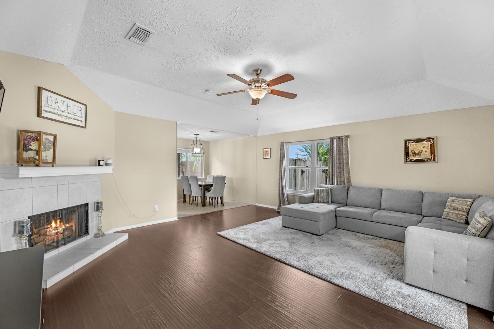 20931 Fernhollow Lane Spring, TX 77388 - Photo 4 of 24 a living room with furniture and a fireplace