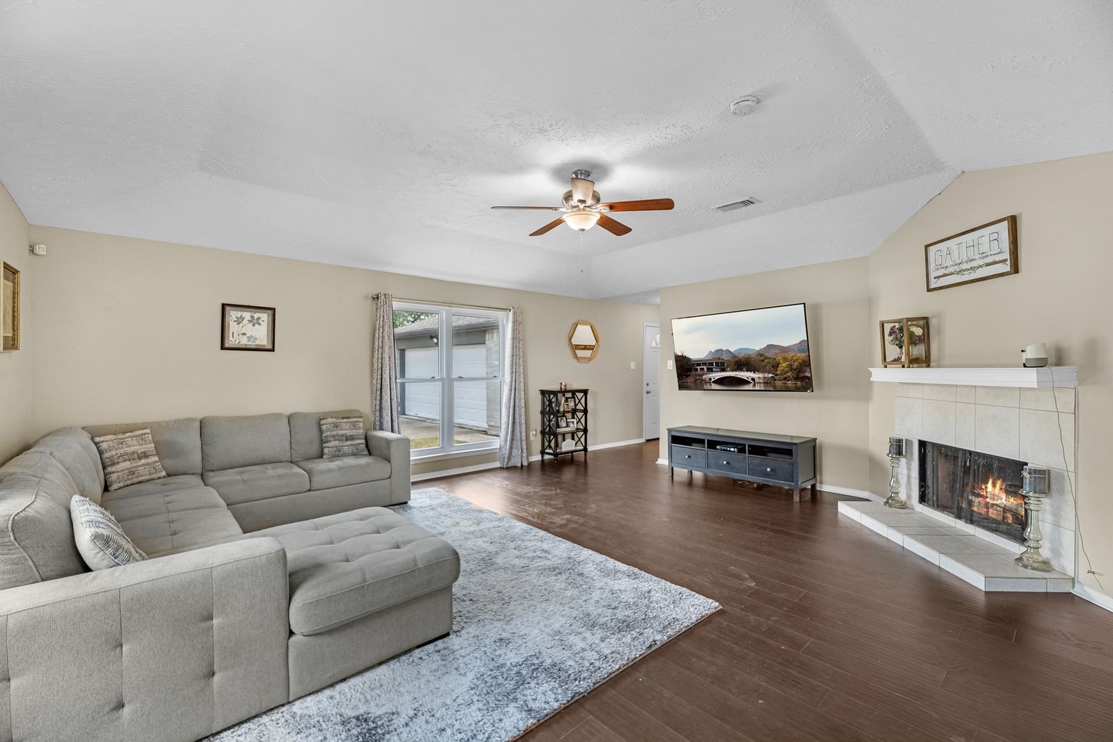 20931 Fernhollow Lane Spring, TX 77388 - Photo 5 of 24 a living room with furniture and a fireplace