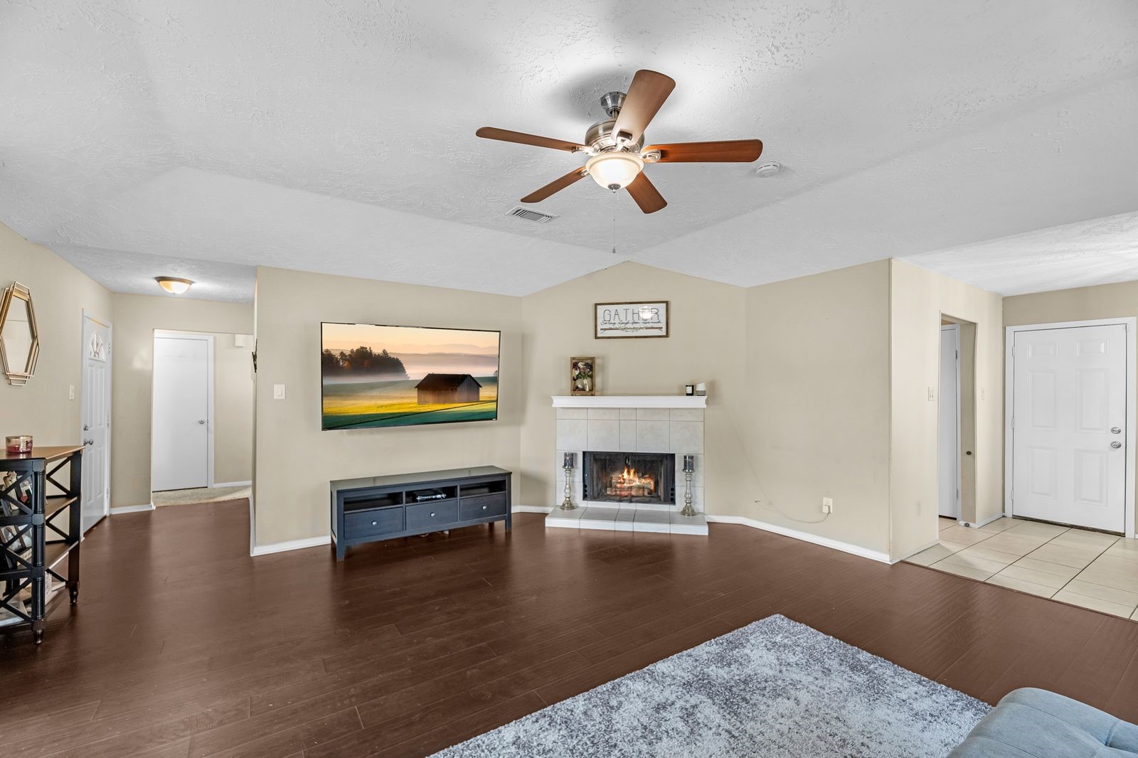 20931 Fernhollow Lane Spring, TX 77388 - Photo 6 of 24 a living room with furniture and a fireplace