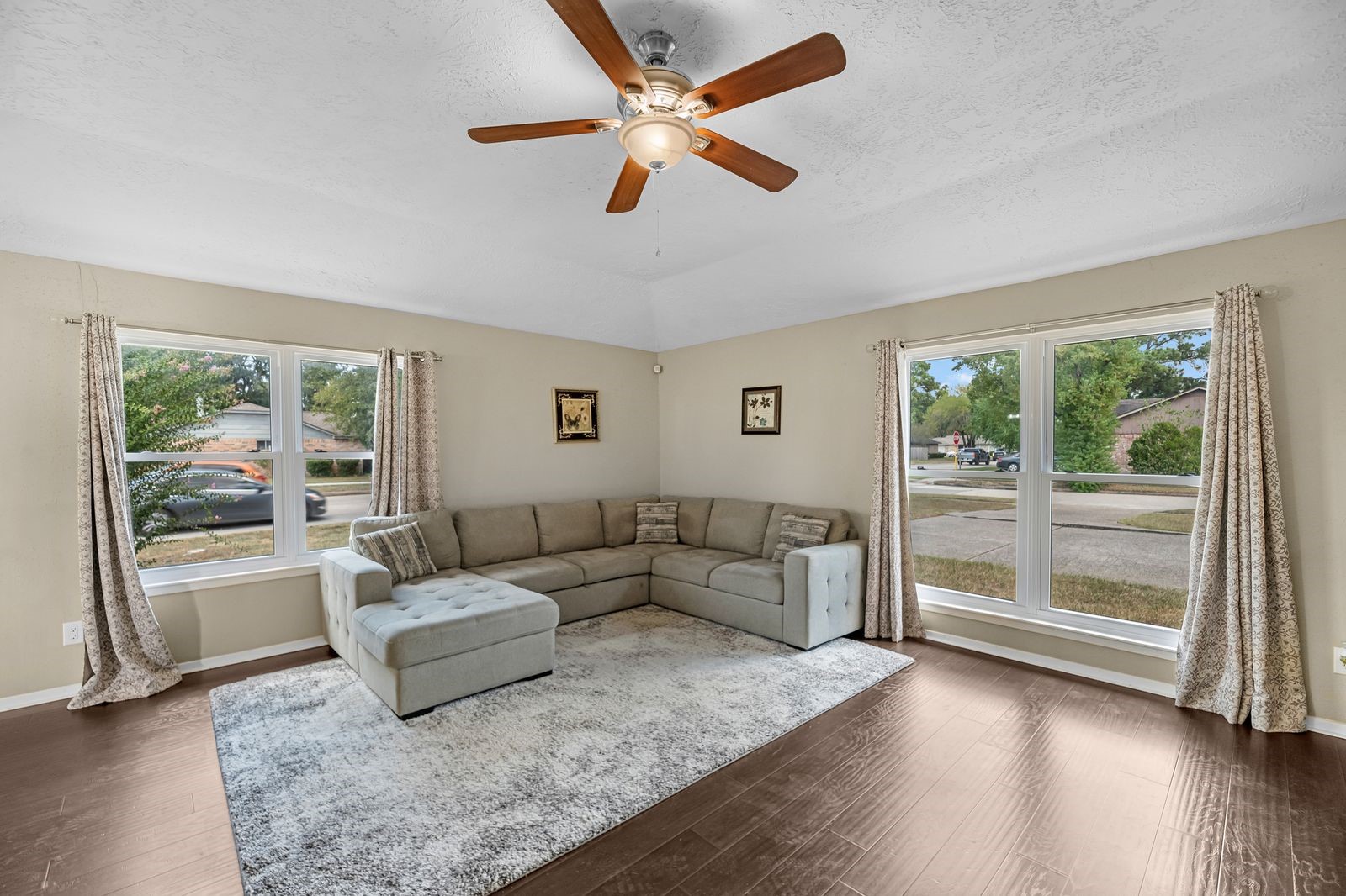 20931 Fernhollow Lane Spring, TX 77388 - Photo 7 of 24 a living room with furniture and a large window with wooden floor