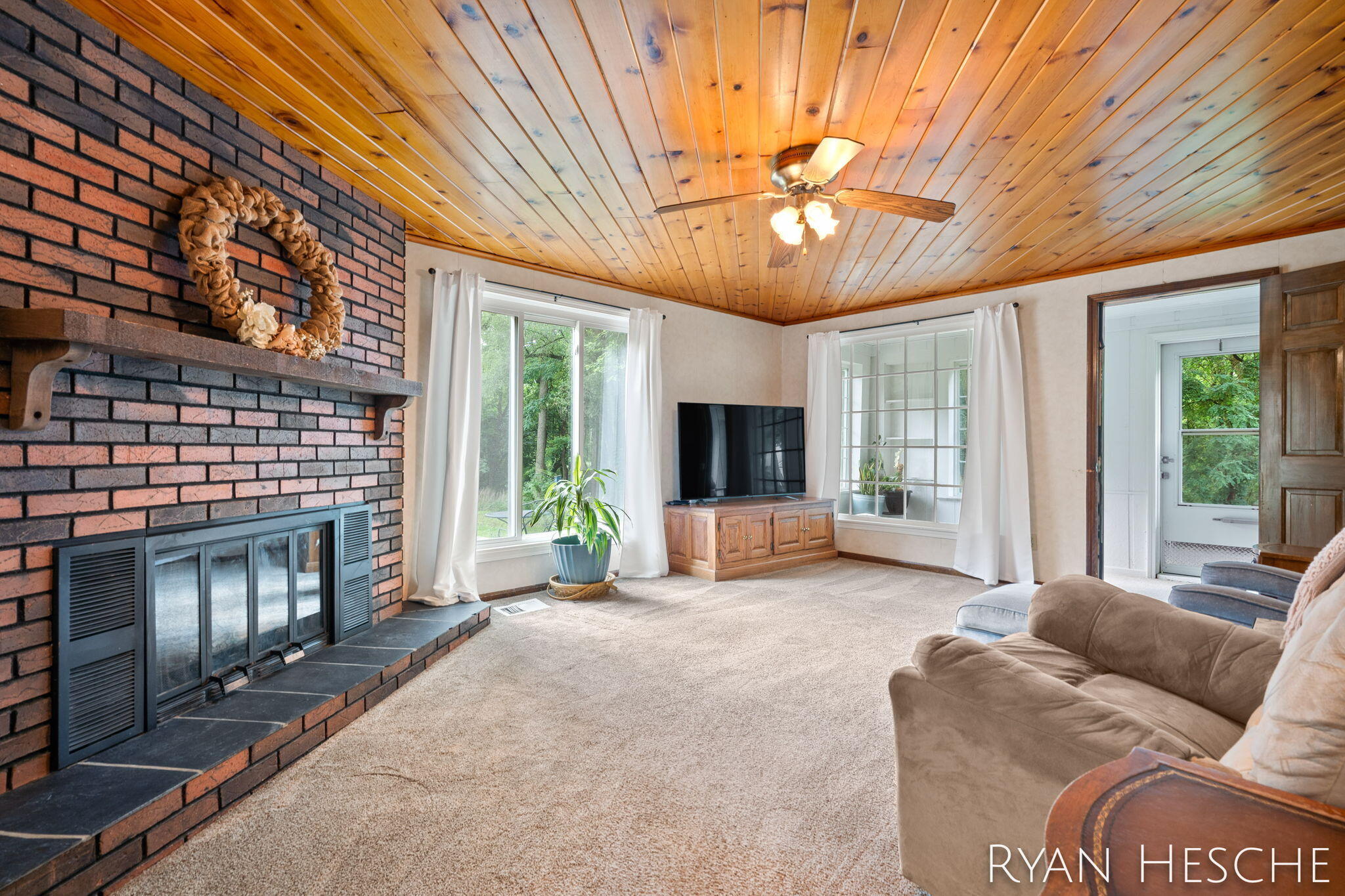 7210 MacArthur Road Saranac, MI 48881 - Photo 16 of 39 Living Room with Gas Log