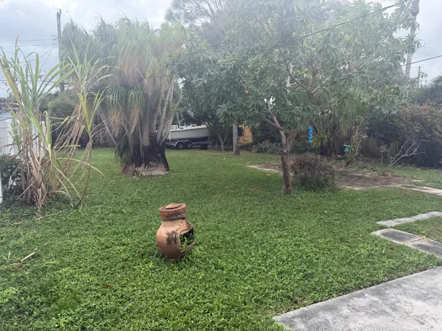 a view of a house with a street