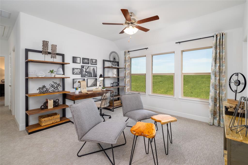 1428 Lady Bird Road Justin, TX 76247 - Photo 10 of 13 a living room with furniture and a large window
