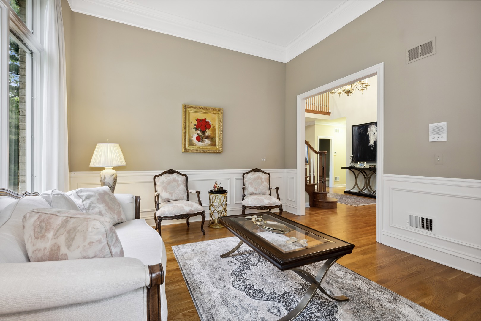 310 Belle Foret Drive Lake Bluff, IL 60044 - Photo 14 of 31 a living room with furniture and a rug