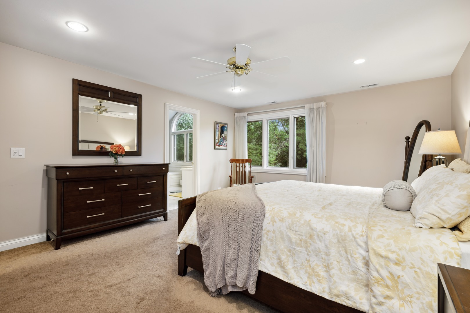 310 Belle Foret Drive Lake Bluff, IL 60044 - Photo 19 of 31 a bedroom with a bed and a dresser