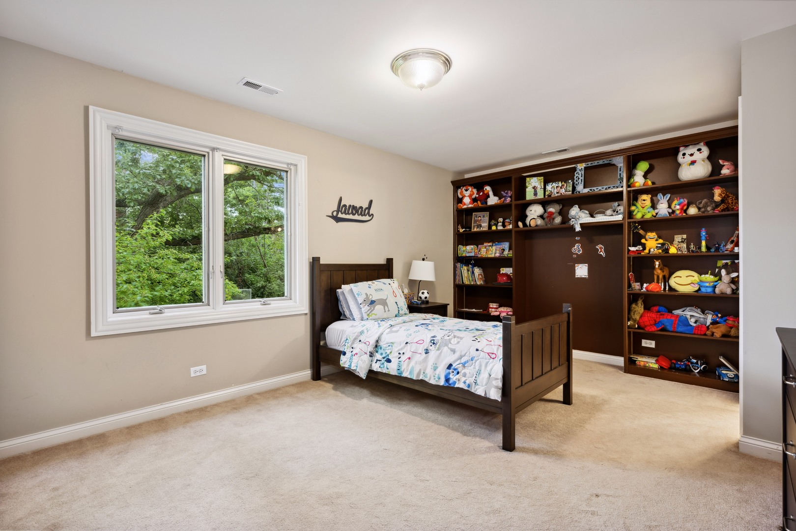 310 Belle Foret Drive Lake Bluff, IL 60044 - Photo 22 of 31 a bedroom with bed and a window