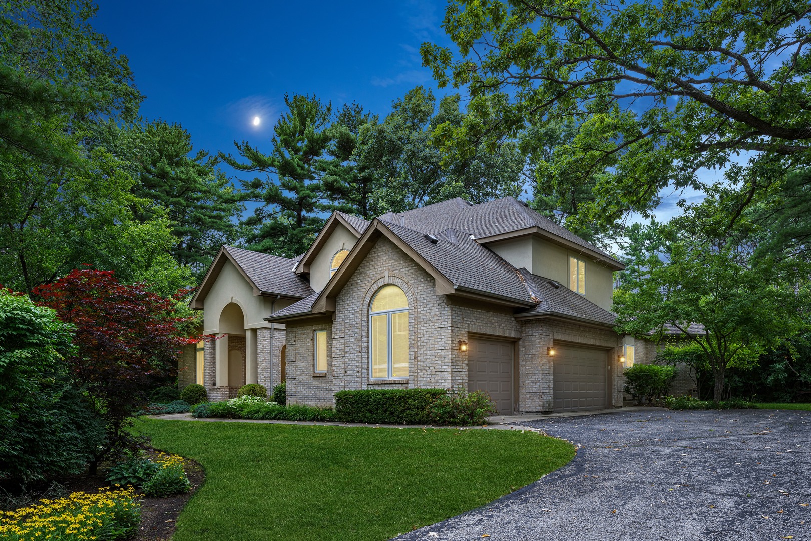 310 Belle Foret Drive Lake Bluff, IL 60044 - Photo 3 of 31 a front view of a house with a yard