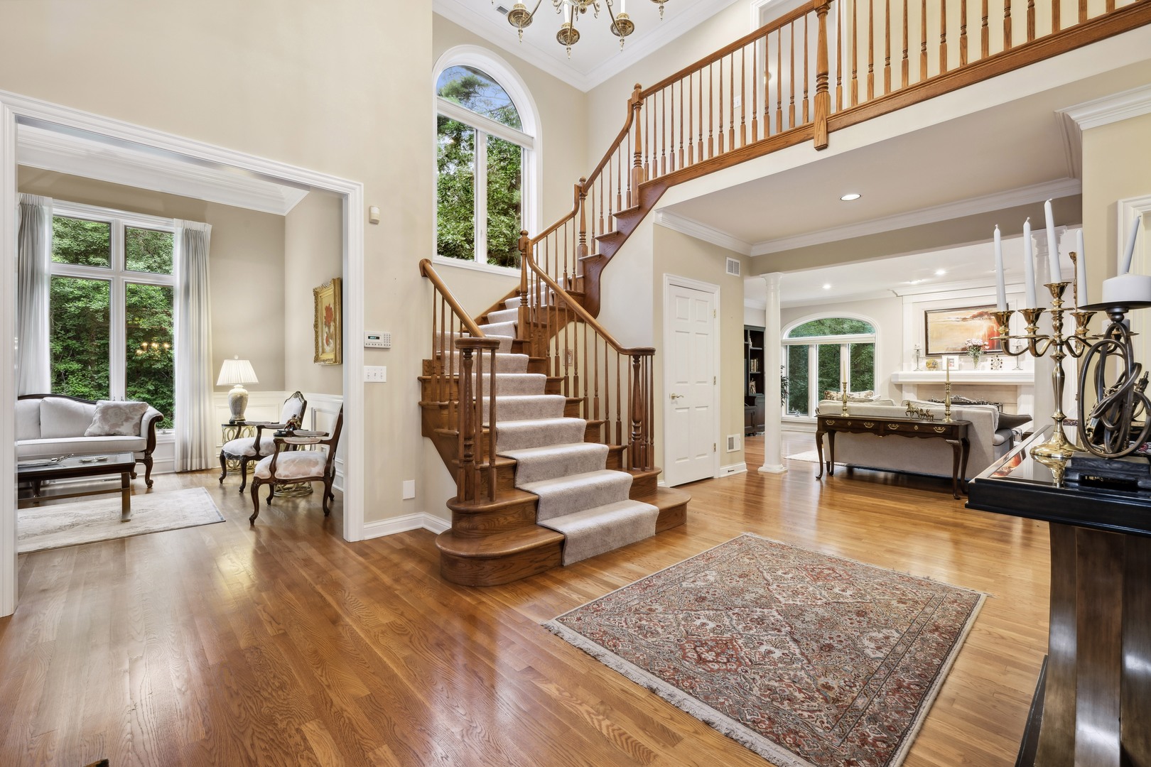 310 Belle Foret Drive Lake Bluff, IL 60044 - Photo 6 of 31 a living room with fireplace furniture and a wooden floor