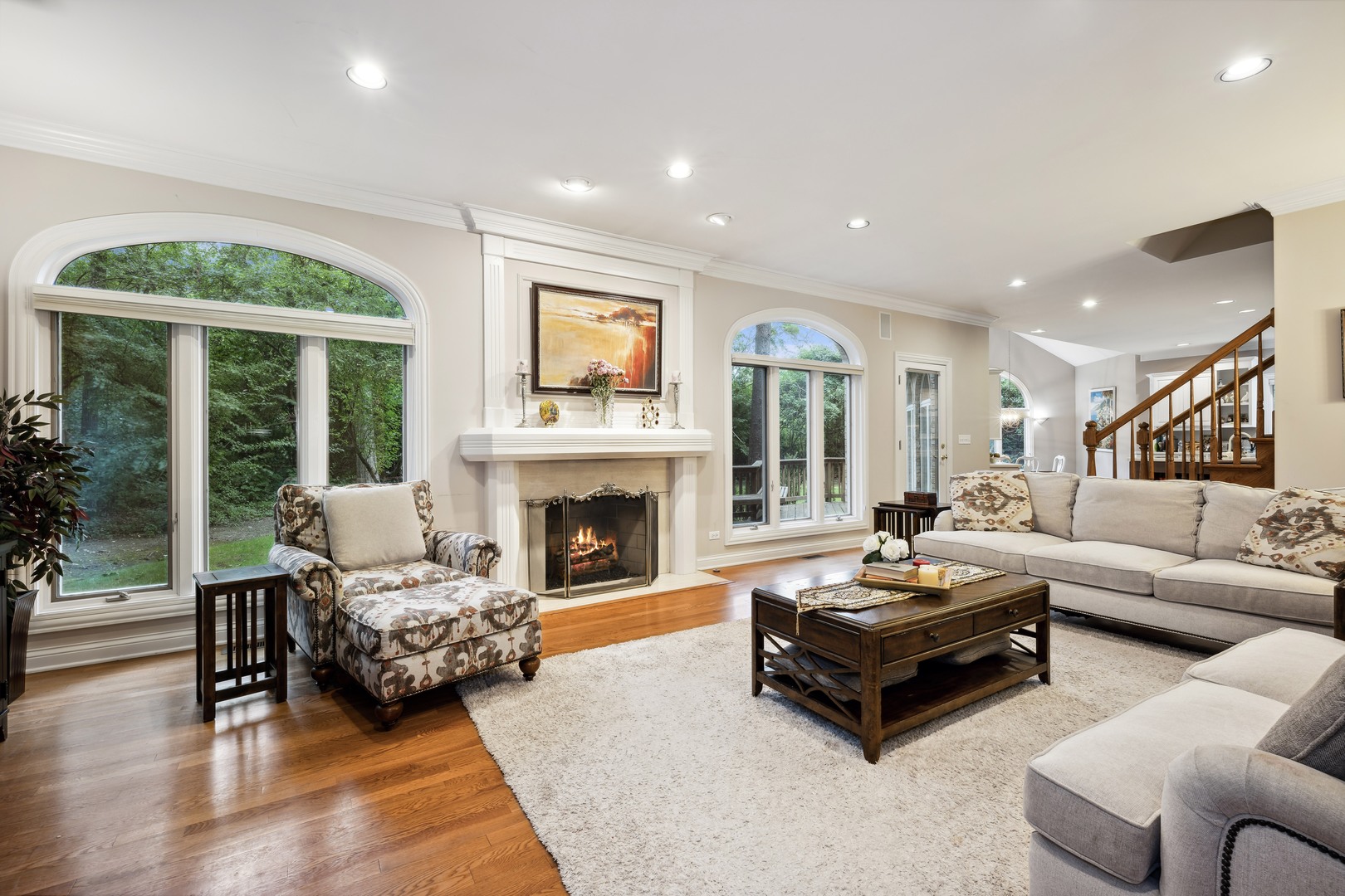 310 Belle Foret Drive Lake Bluff, IL 60044 - Photo 8 of 31 a living room with furniture and a fireplace