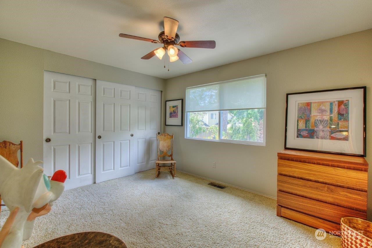 32911 4th Lane South Federal Way, WA 98003 - Photo 14 of 19 a view of livingroom with furniture fan and windows