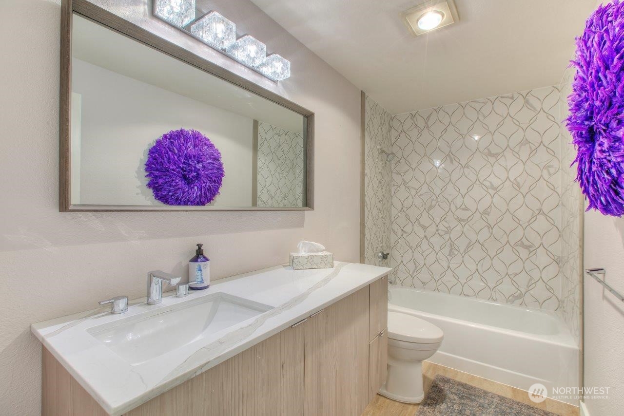 32911 4th Lane South Federal Way, WA 98003 - Photo 15 of 19 a bathroom with a sink mirror toilet and bathtub