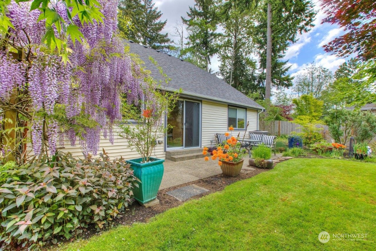 32911 4th Lane South Federal Way, WA 98003 - Photo 17 of 19 a view of a house with backyard and sitting area