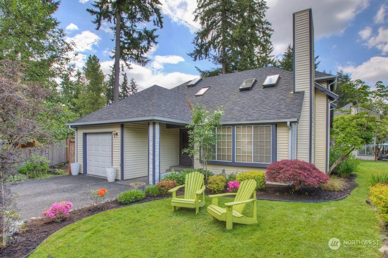 32911 4th Lane South Federal Way, WA 98003 - Photo 19 of 19 a front view of a house with yard and outdoor seating