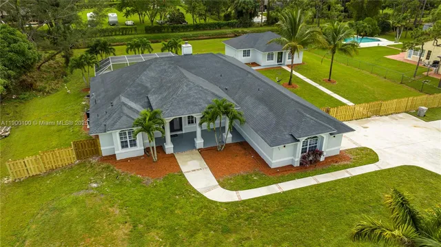 a view of a house with a big yard