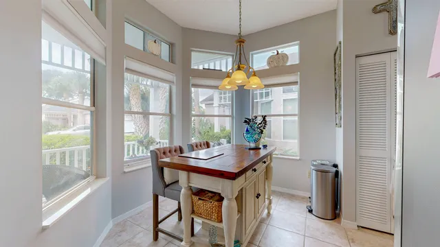 a kitchen with stainless steel appliances sink stove and cabinets
