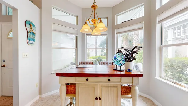a kitchen with a white cabinets and white appliances