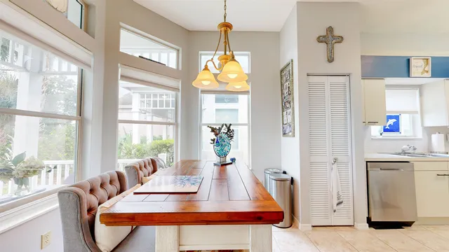 a kitchen with a stove and a white cabinets