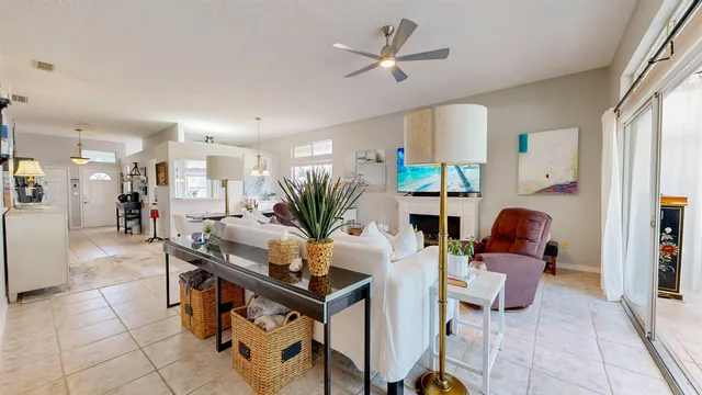 a bedroom with bed and a large mirror