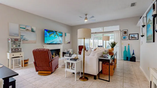 a bedroom with a bed and flat screen tv