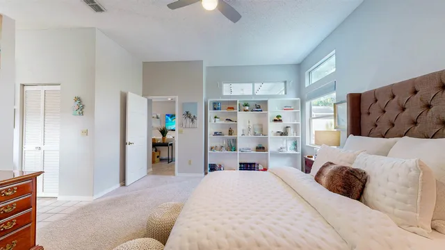a bathroom with double vanity sink and a mirror