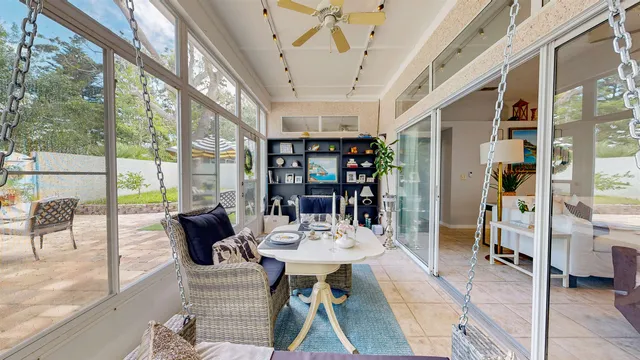 a view of an chairs and tables in the patio