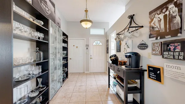 a view of a dining room with furniture window and outside view