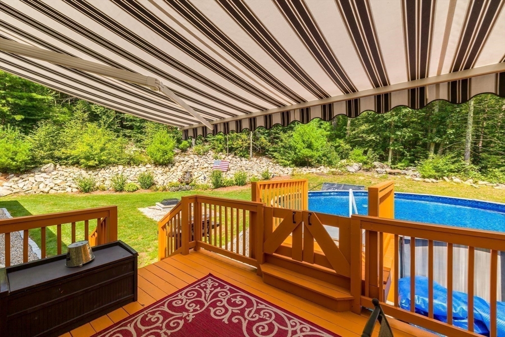 297 Manchaug Road Sutton, MA 01590 - Photo 27 of 40 a view of a chairs on the roof deck