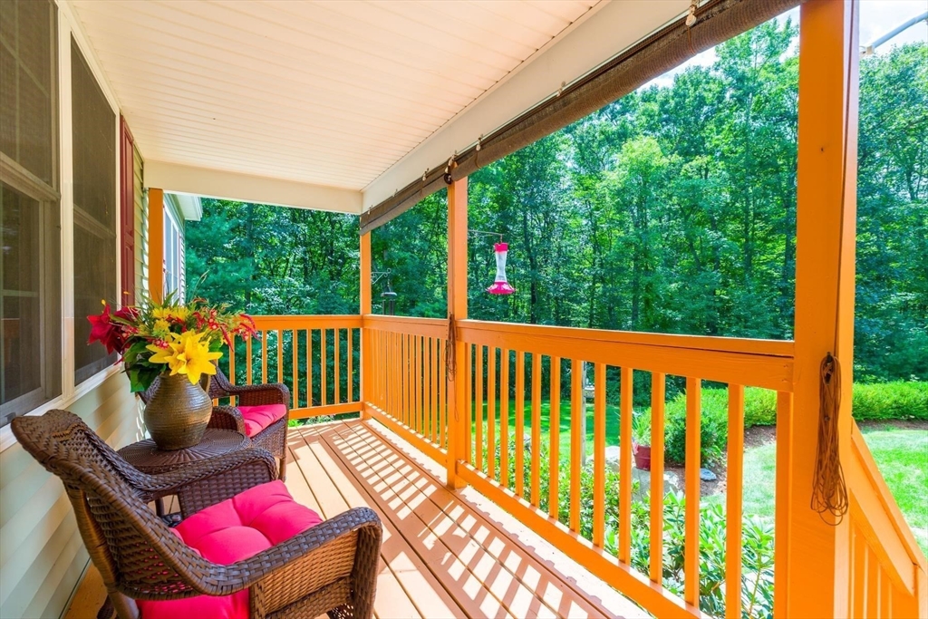 297 Manchaug Road Sutton, MA 01590 - Photo 3 of 40 a view of balcony with a potted plant