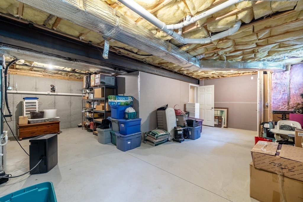 297 Manchaug Road Sutton, MA 01590 - Photo 36 of 40 a view of storage and utility room