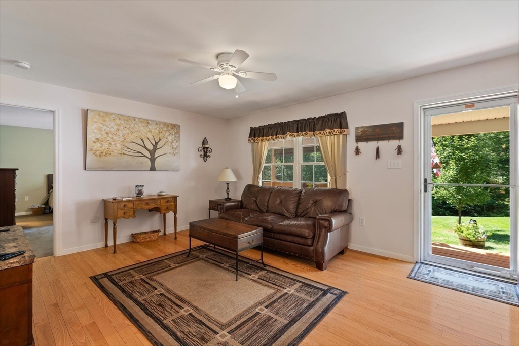297 Manchaug Road Sutton, MA 01590 - Photo 6 of 40 a living room with furniture and a window