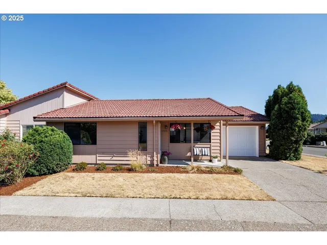 a house view with a outdoor space