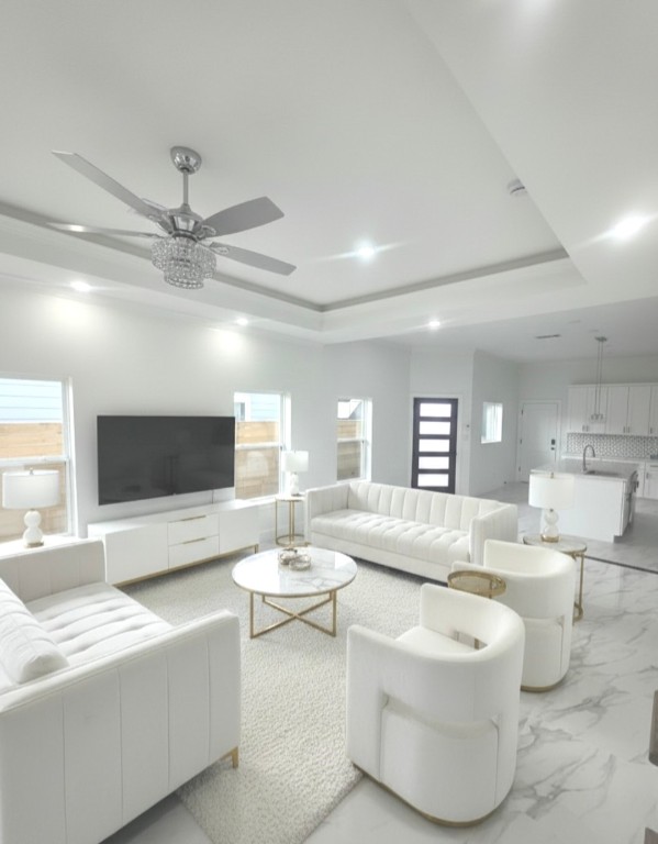 8312 Comal Street Houston, TX 77051 - Photo 1 of 17 a living room with furniture and a flat screen tv
