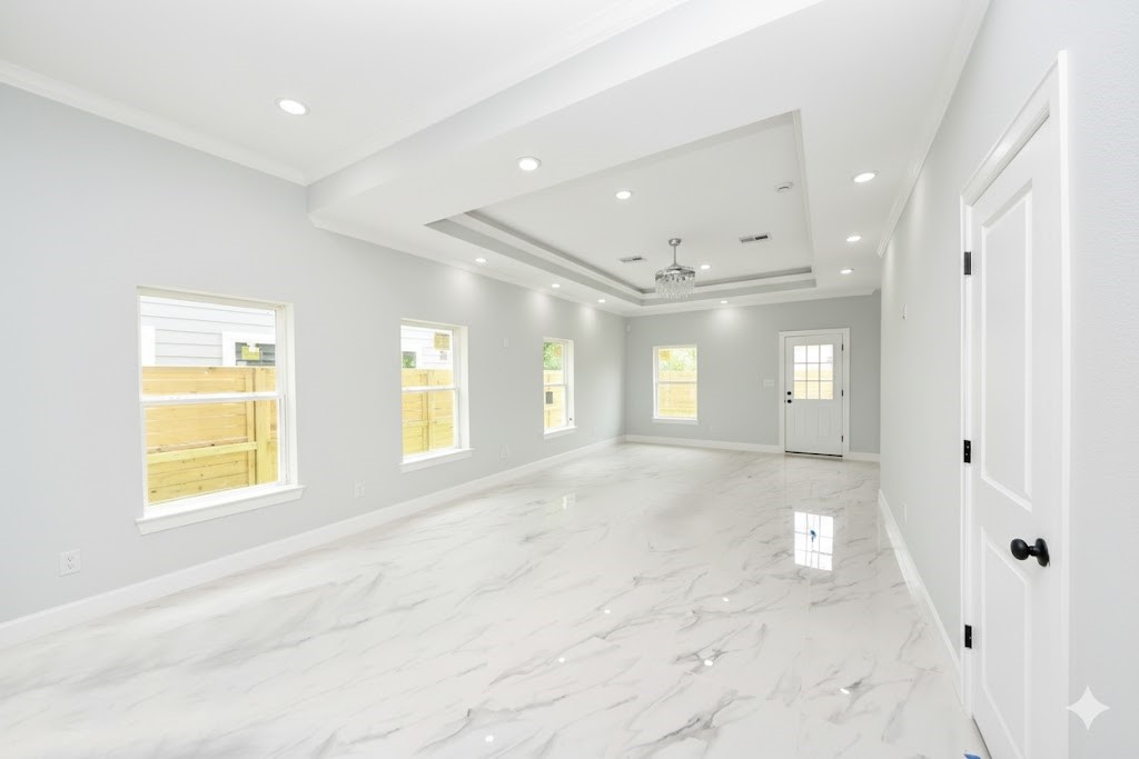 8312 Comal Street Houston, TX 77051 - Photo 3 of 17 a view of an empty room with a window