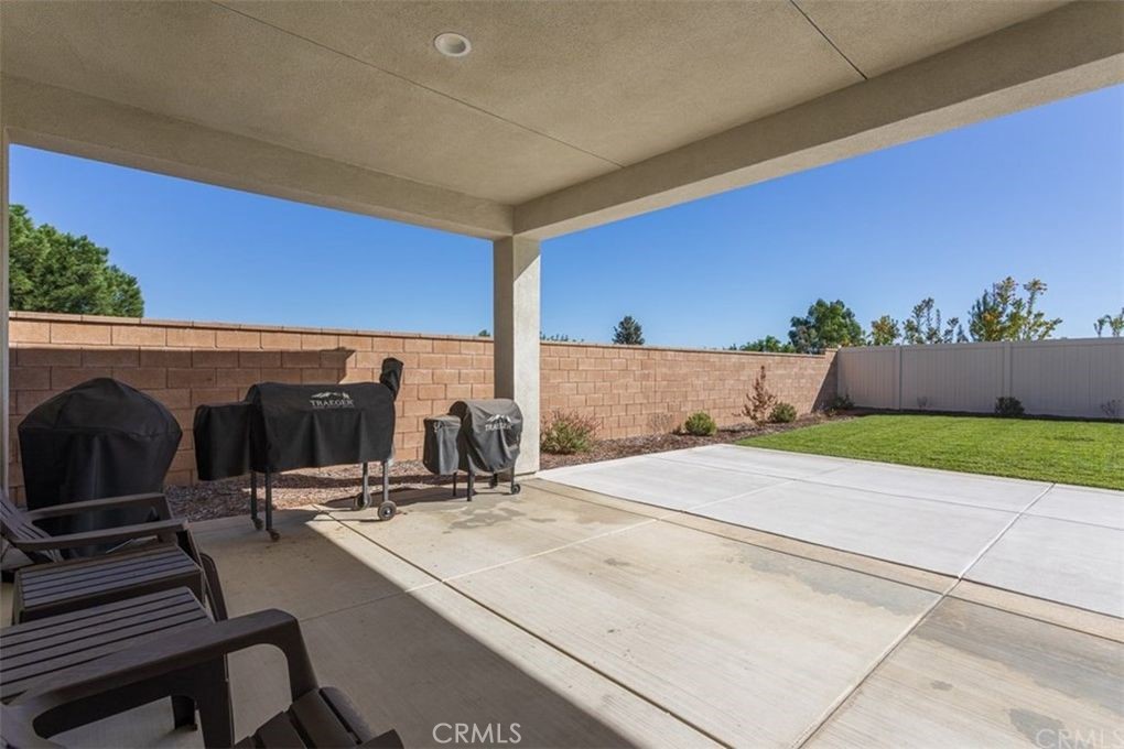 24125 Montecito Drive Wildomar, CA 92595 - Photo 23 of 25 a view of a room with gym equipment