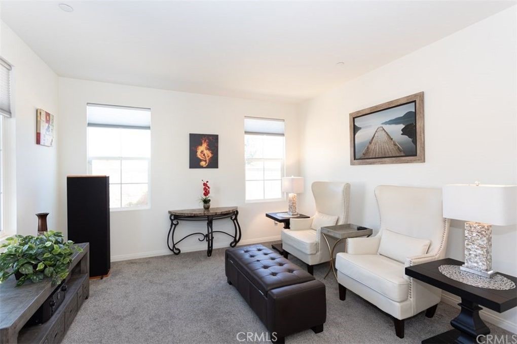 24125 Montecito Drive Wildomar, CA 92595 - Photo 5 of 25 a living room with furniture and a window
