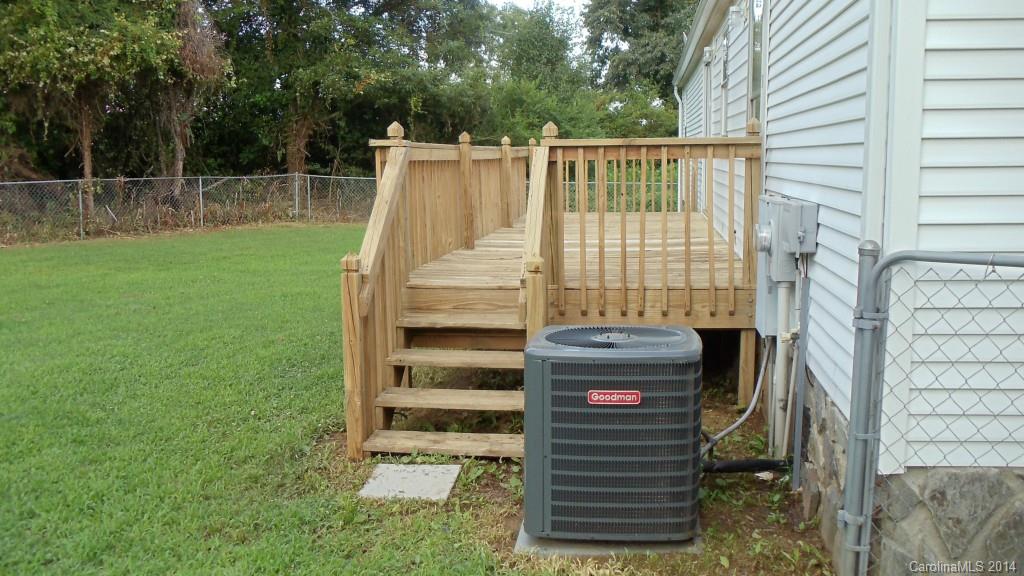 1766 North Ingleside Farm Road Iron Station, NC 28080 - Photo 19 of 23 a view of a deck with a backyard