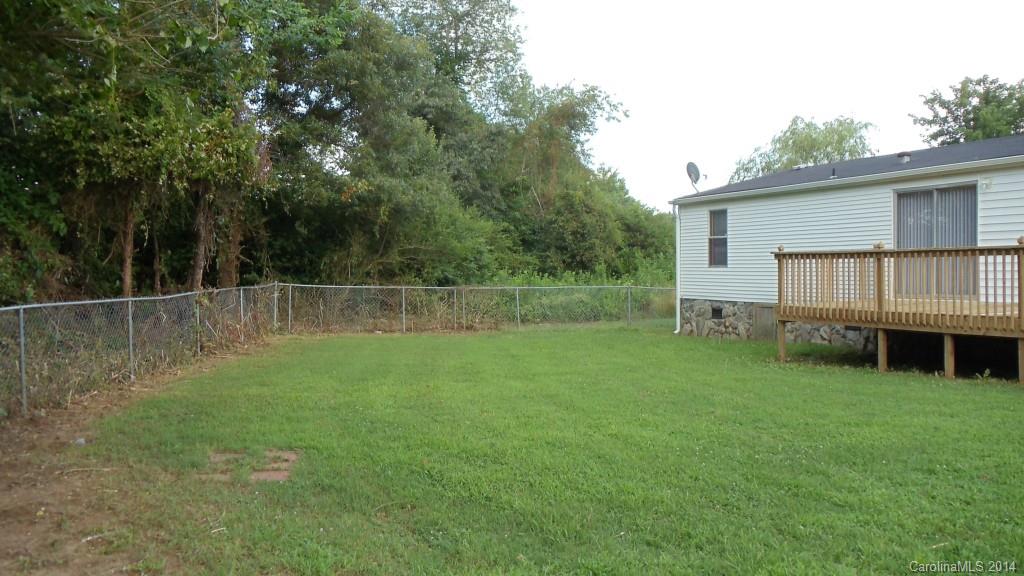 1766 North Ingleside Farm Road Iron Station, NC 28080 - Photo 21 of 23 a view of a backyard with a garden